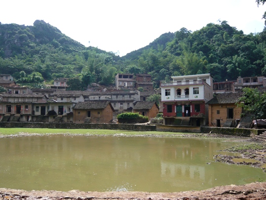 Polluted pond in a village in Guangxi