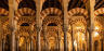 Interior of Mosque-Cathedral of Córdoba with red and white striped arches and marble columns